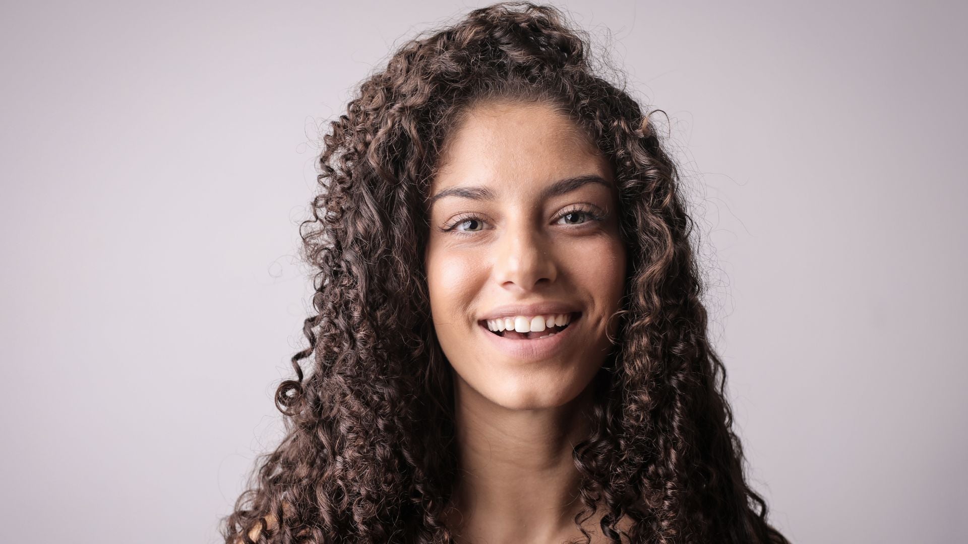 Silk vs. Satin Pillowcases: Which Are Better for Curly Hair?