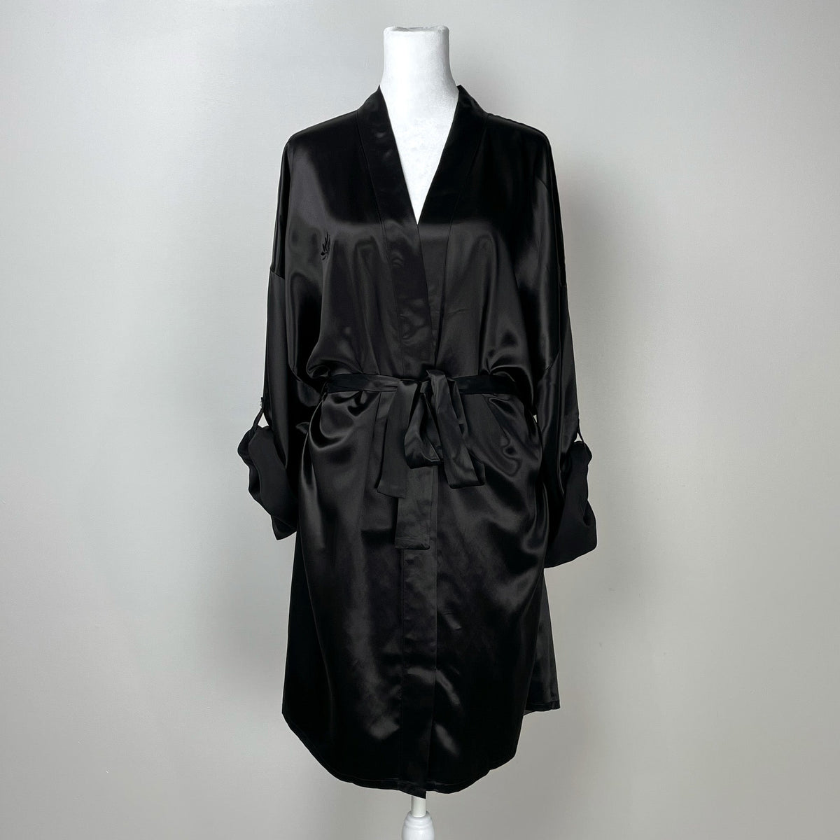 Womens silk kimono robe displayed on a mannequin, showcasing its elegant design and flow