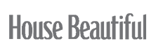 The words House Beautiful in bold, gray, silk-inspired sans-serif font on a light background.