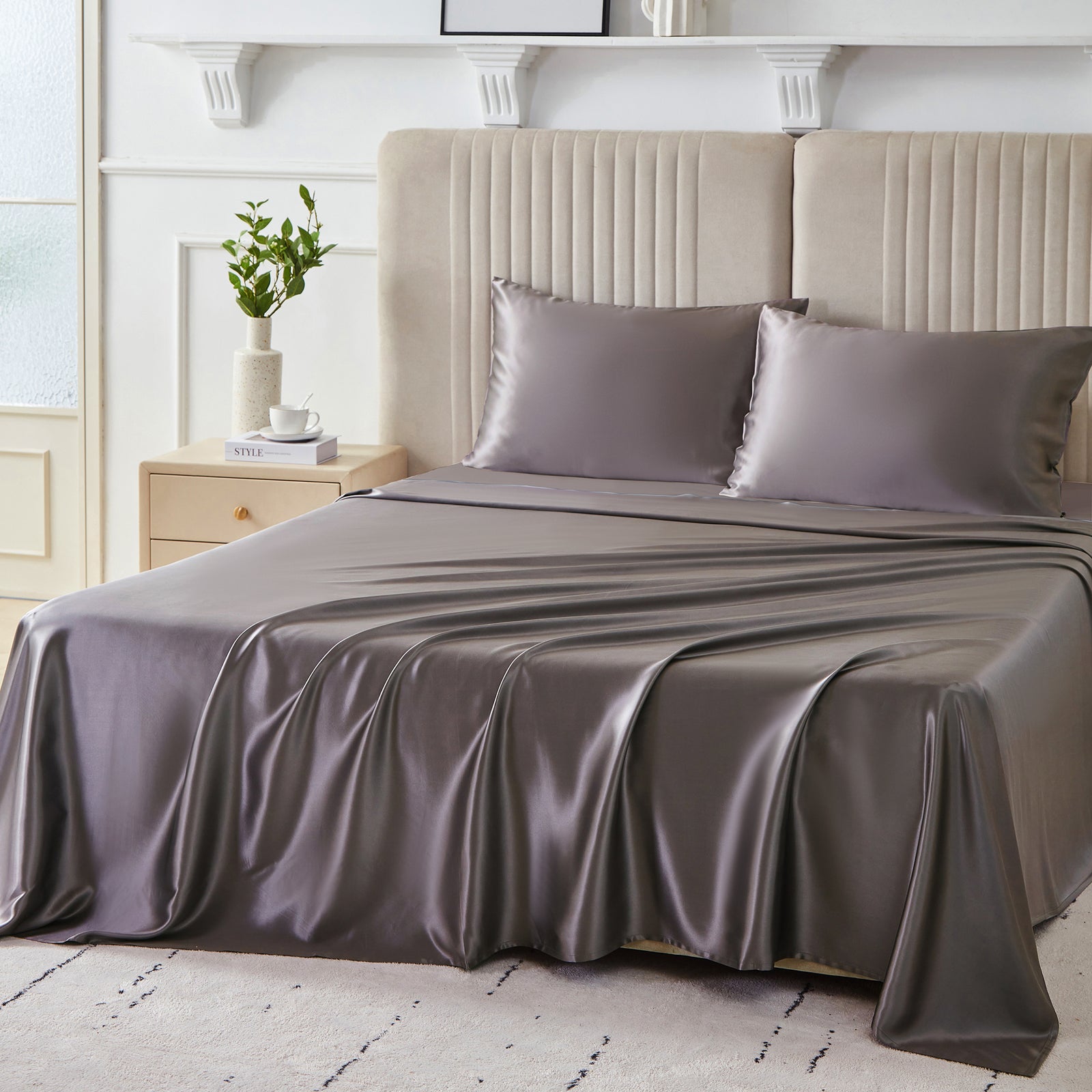 Elegant 22 Momme Silk Sheets Set in Gunmetal color displayed on a beautiful bed with silk pillows