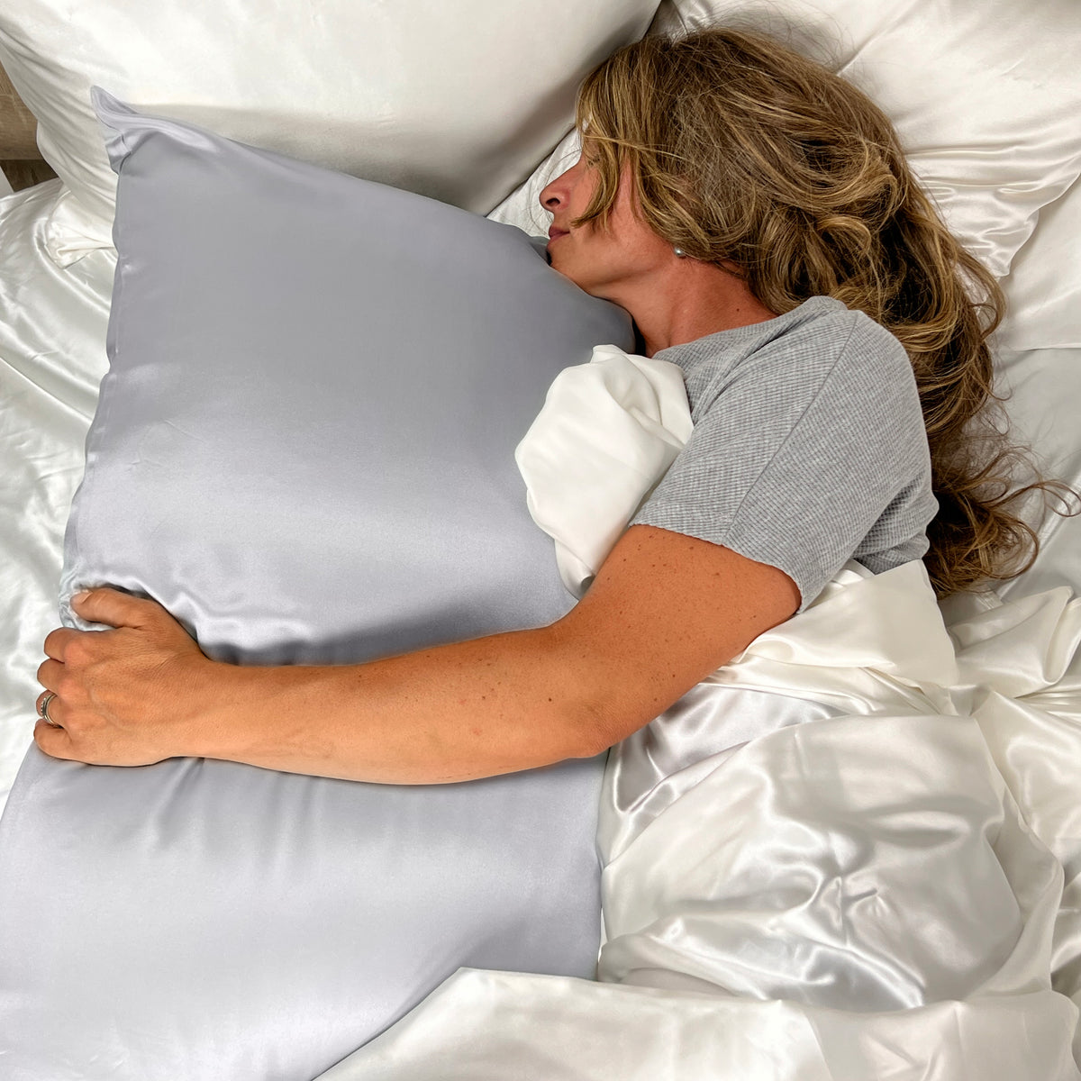 Soft Silver Silk Pillowcase with a lustrous sheen, offering a smooth and luxurious touch