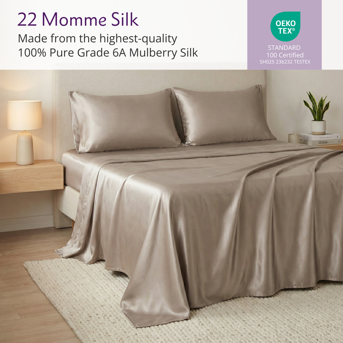 A bed with shiny taupe 22 momme silk sheets and pillowcases in a neatly decorated bedroom with a lamp and plant.