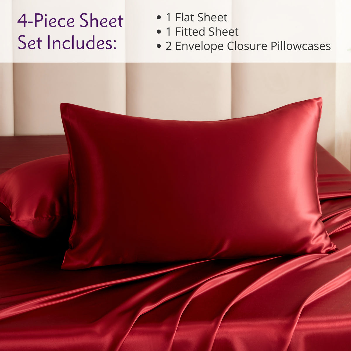 Red silk sheet set with pillows on a bed against a beige wall.