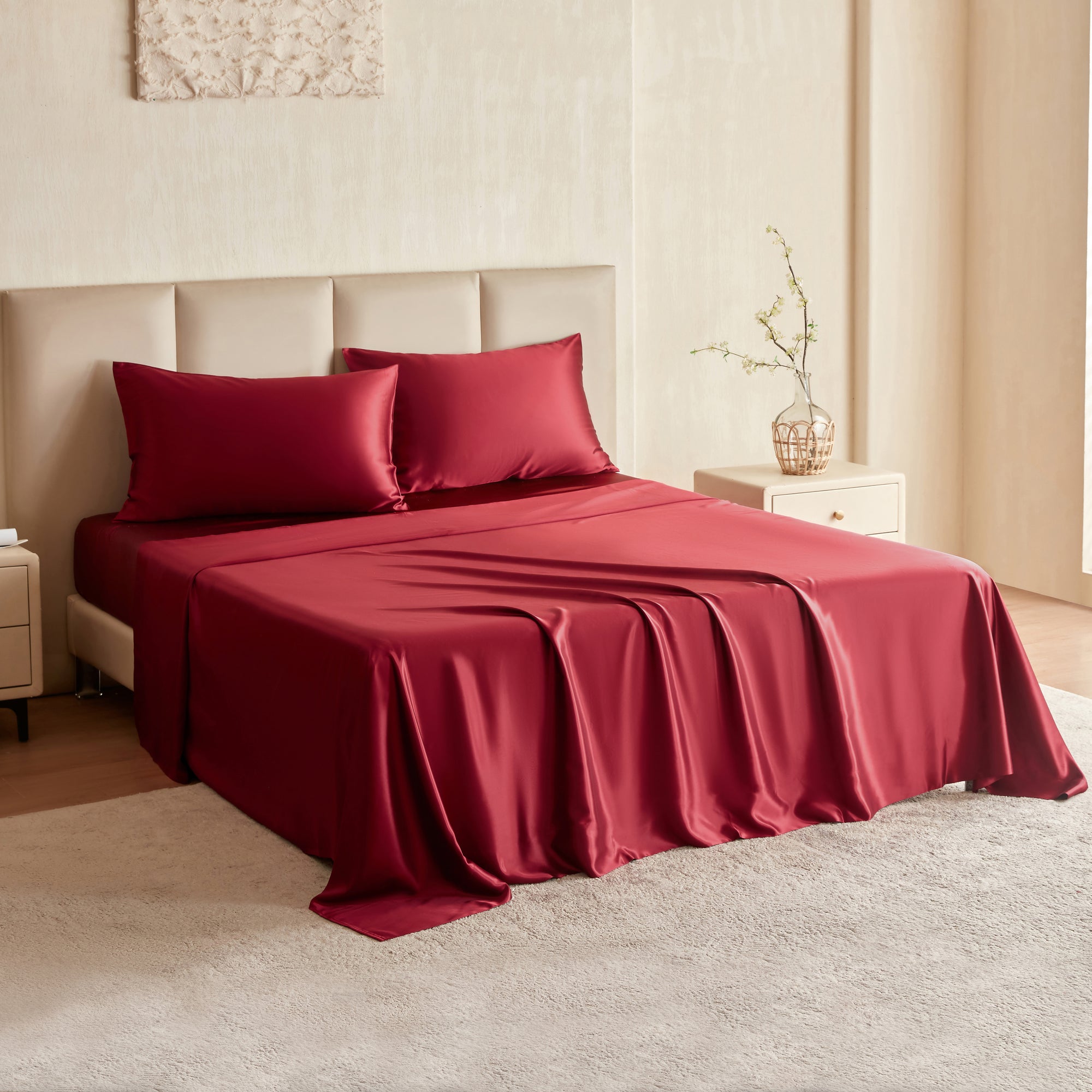 Red Silk sheet on a bed in a bedroom setting