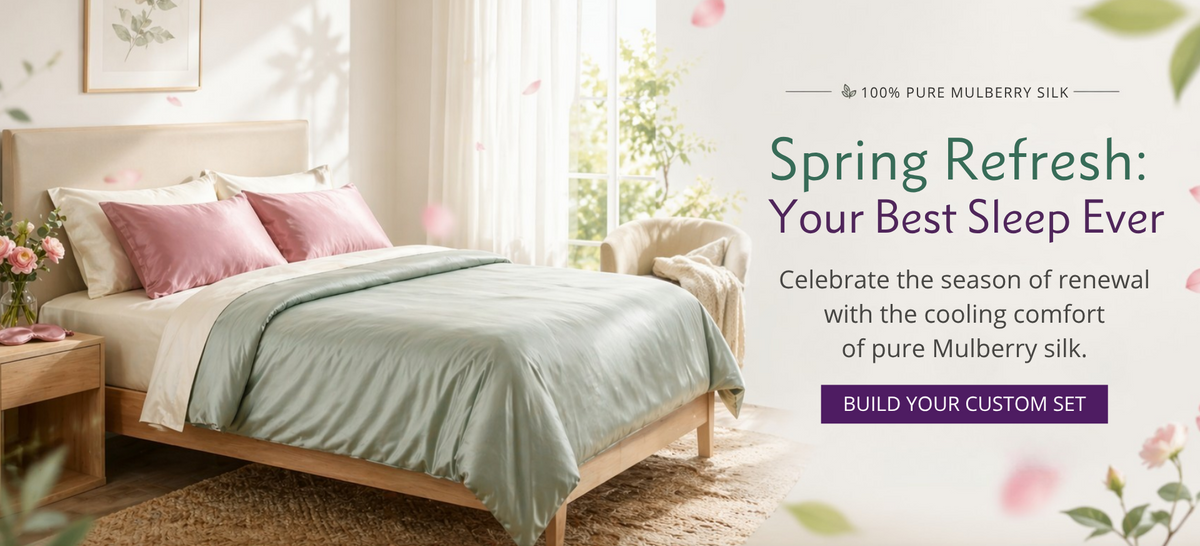 Bedroom with light green bedding and pink pillows, featuring a promotional message for silk bedding.
